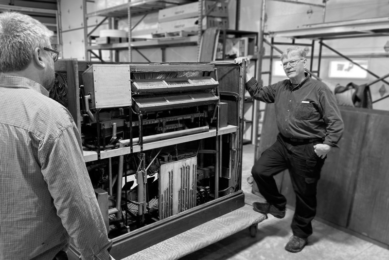 Artisan working on organ piece